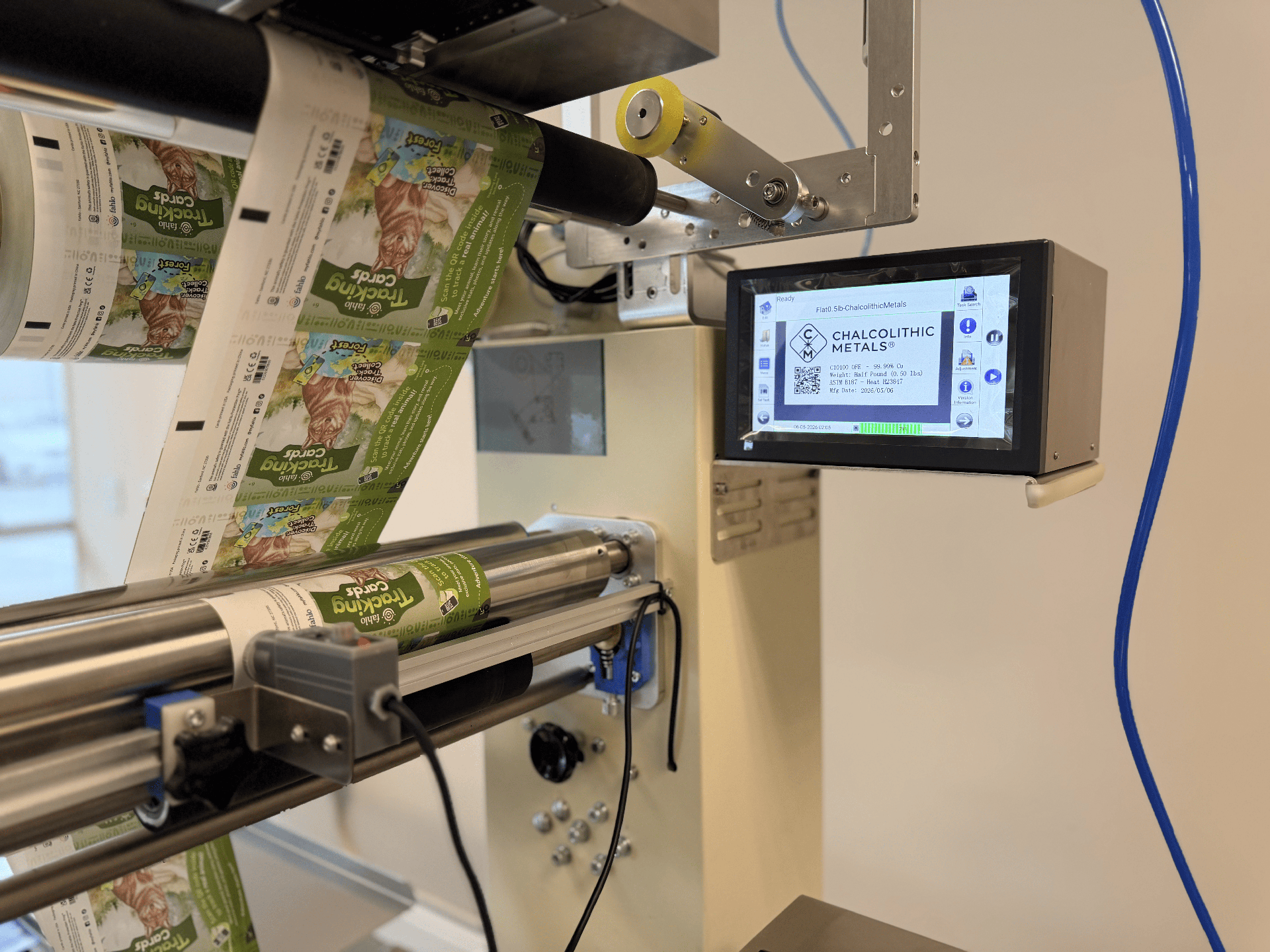 Card packaging machine with touchscreen control panel