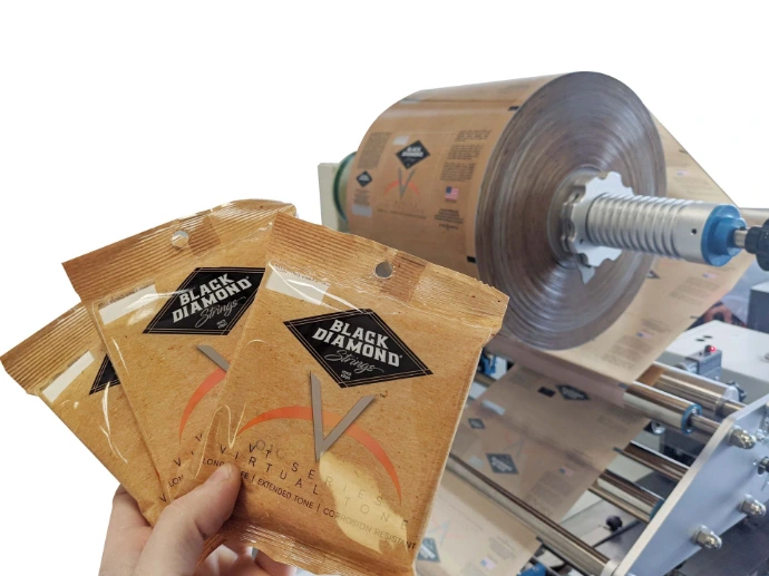 Black Diamond custom-printed film packages beside packaging equipment