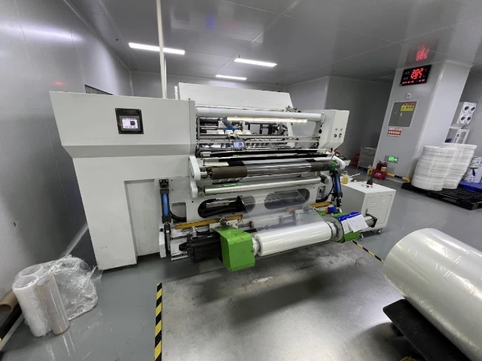 Lamination equipment with film threaded through rollers